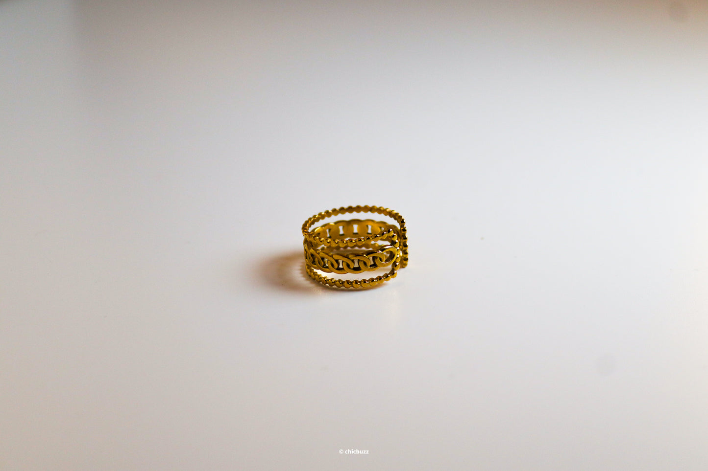 chained luxe ring