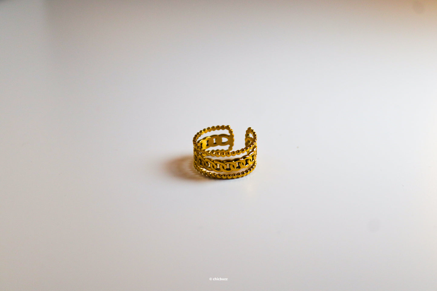 chained luxe ring